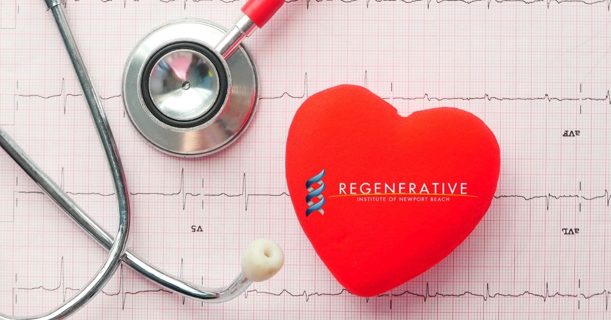 Heart-shaped stress ball with the Regenerative Institute logo on ECG paper, accompanied by a stethoscope